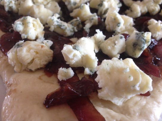 Olas & Chanclas | Carmalized Balsamic Onion and Blue Cheese Pizza with Basil