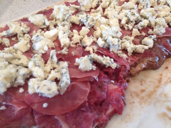 Olas & Chanclas | Marinated Flank Steak Stuffed with Balsamic Caramelized Onions, Blue Cheese, Prosciutto and Basil 